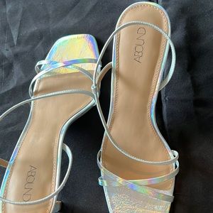 Dress heels they are Silver Iridescent.